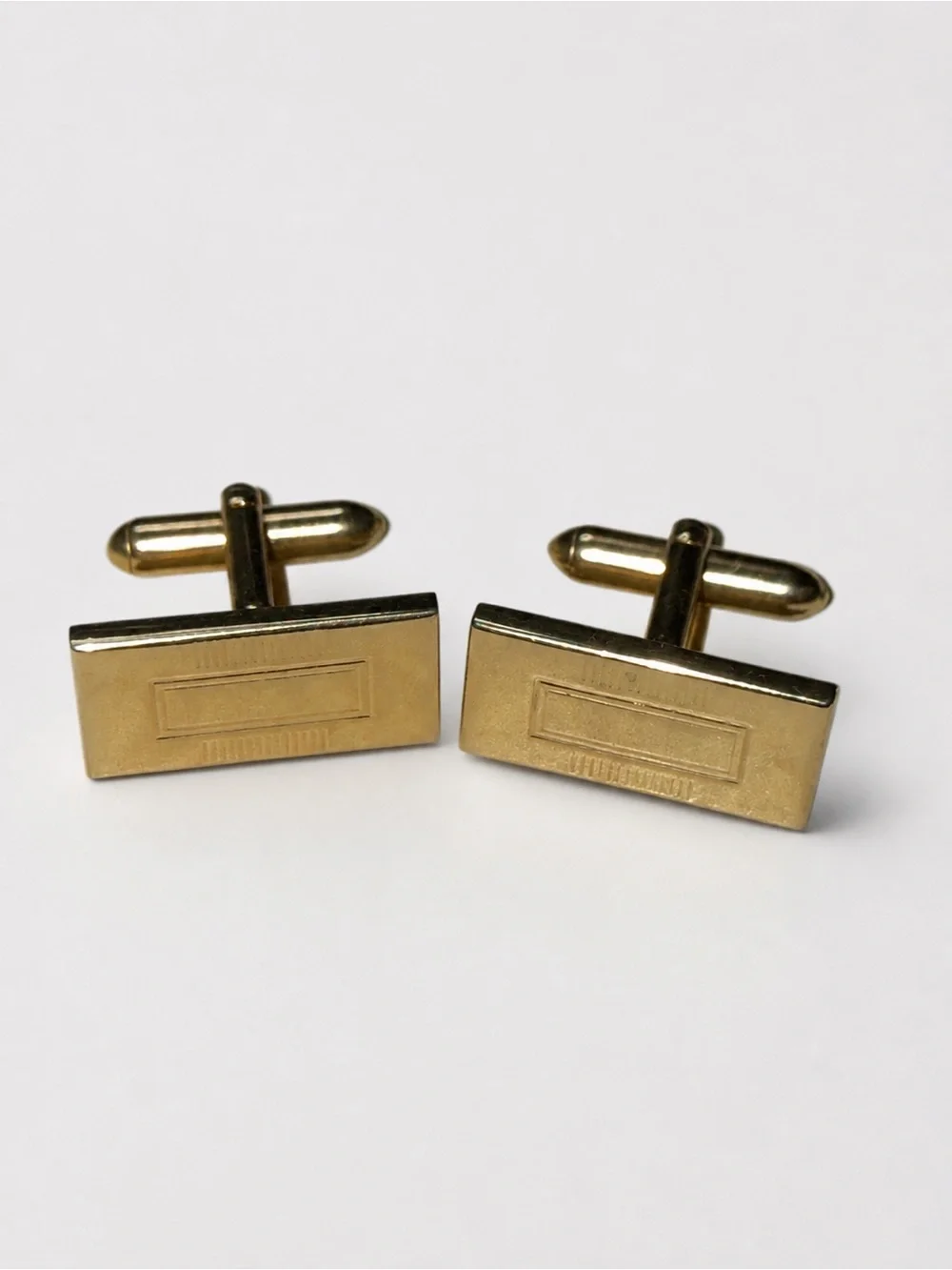 Vintage Swank rectangle etched cuff links in gold tone metal retro